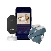 Das „Owlet Dream Duo mit Ersatzsocke“ von Owletcare.de umfasst eine Babyphone-Kamera, ein Smartphone mit der Schlafanalyse-App sowie zwei „Dream Sock“-Wearables mit blauen Stoffbändern und weißen Sensoren zur Überwachung der Vitalwerte.